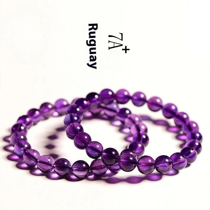 Natural amethyst Uruguay bracelet with polished purple beads, shown in single circle and triple ring designs.