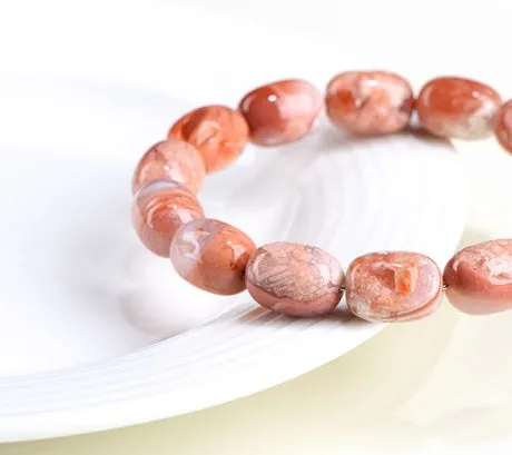 Natural cherry agate barrel shaped bead bracelet with 10x14mm geometry beads and Ruyi design elements