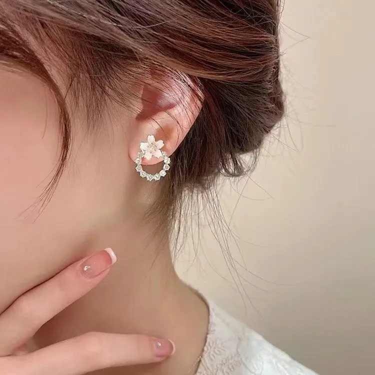 Fashion dripping oil peach blossom stud earrings for women in alloy with electroplated finish