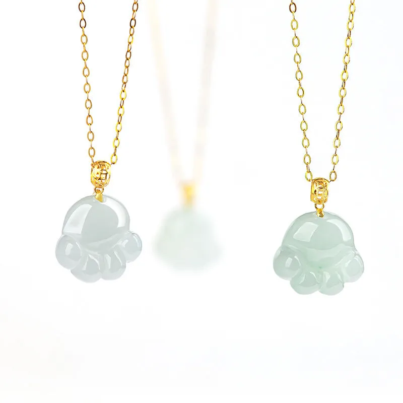 Emerald light green jade cat's paw pendant with 18K gold buckle and certificate on a white background