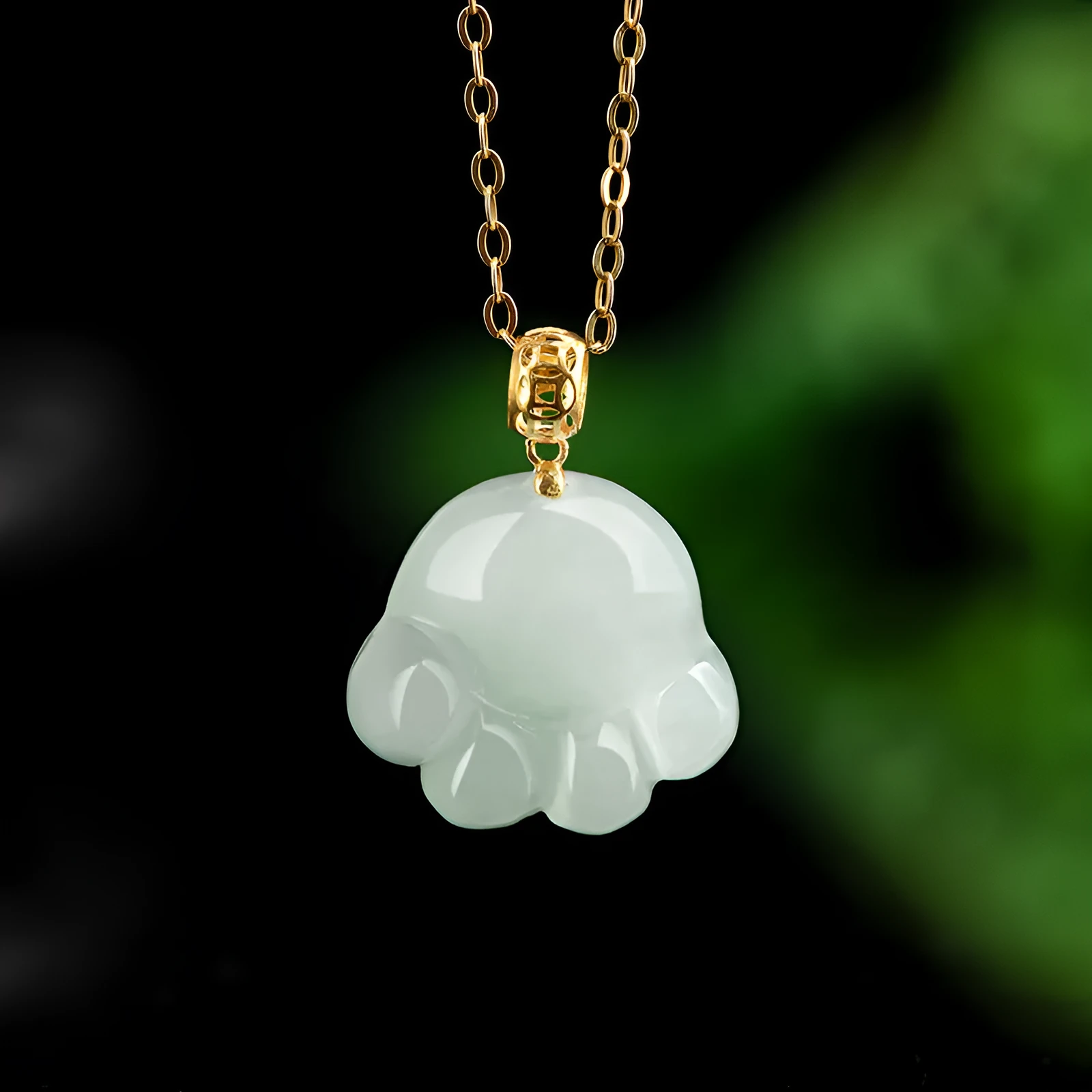 Emerald light green jade cat's paw pendant with 18K gold buckle and certificate on a white background