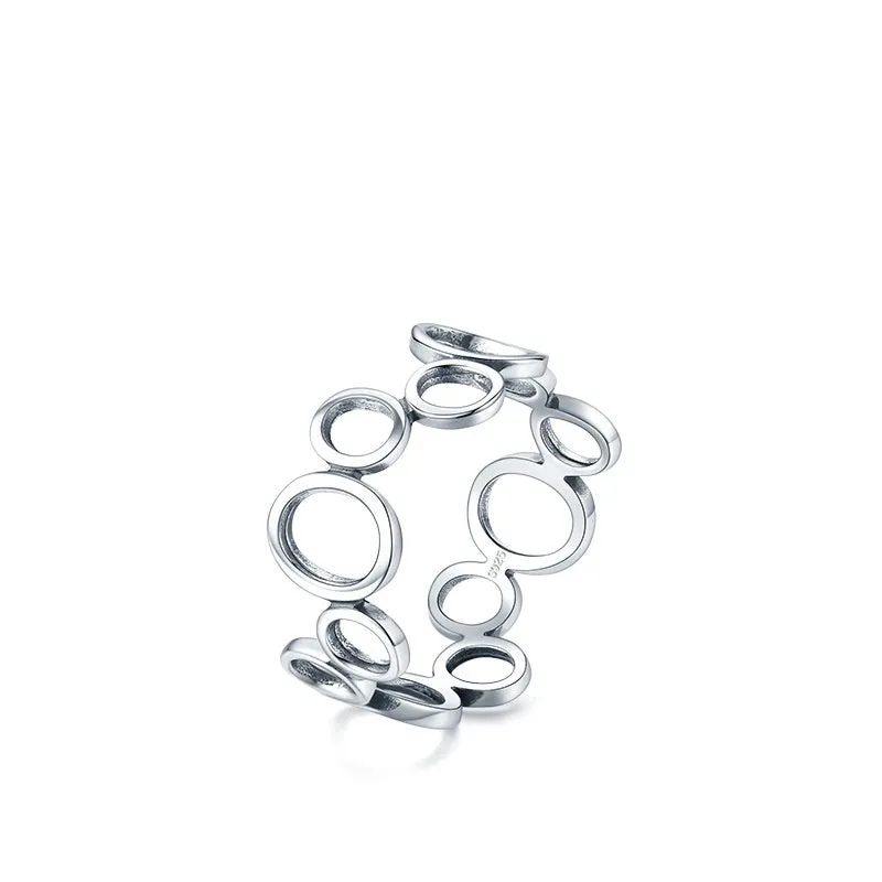 S925 sterling silver geometric circle ring with ellipse motif, women's size US 7 on display