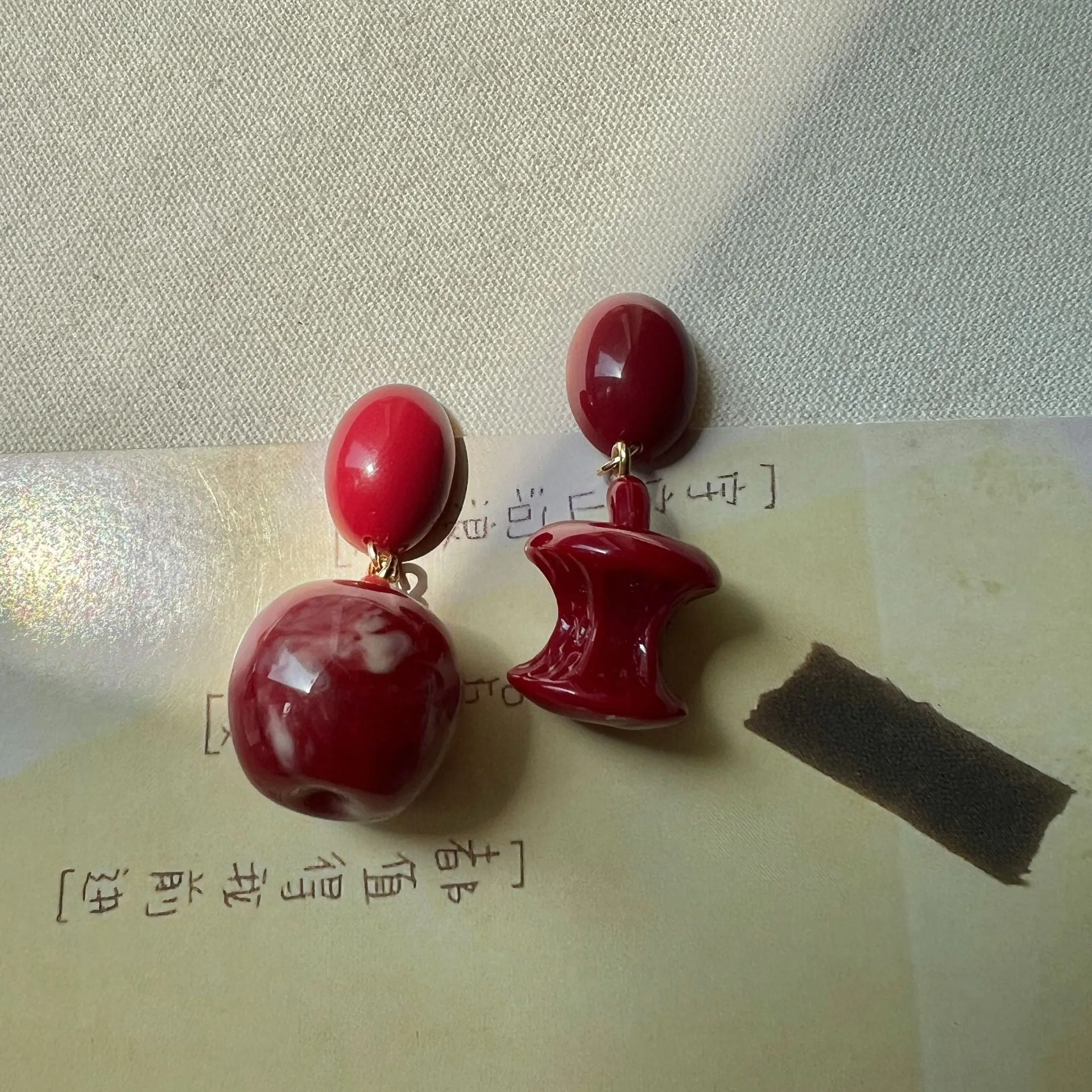 Red apple earrings for women, alloy material, round fruit shape, available as studs or clips