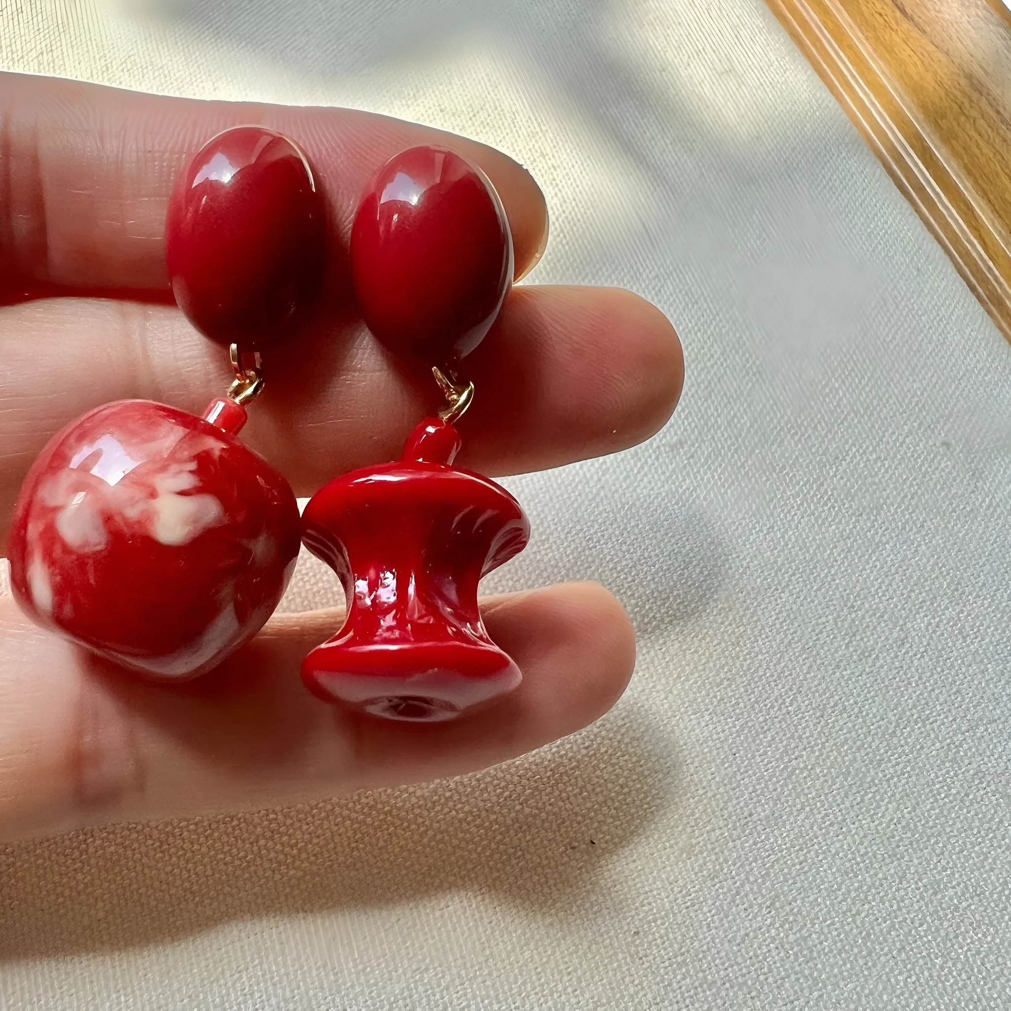 Red apple earrings for women, alloy material, round fruit shape, available as studs or clips