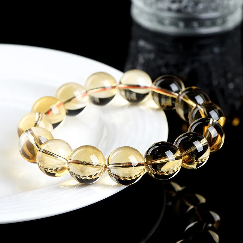 Natural citrine scattered beads ball bracelet in 7A and 6A colour grades on a wrist.