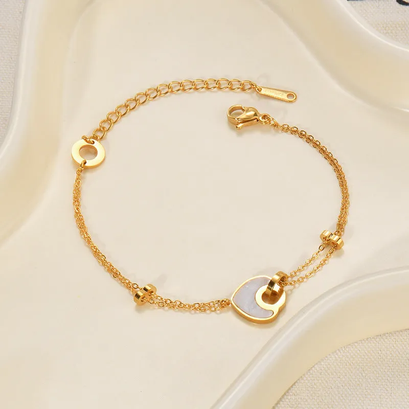 Women's ins style stainless steel bracelet with a double-layered electroplated resin heart charm