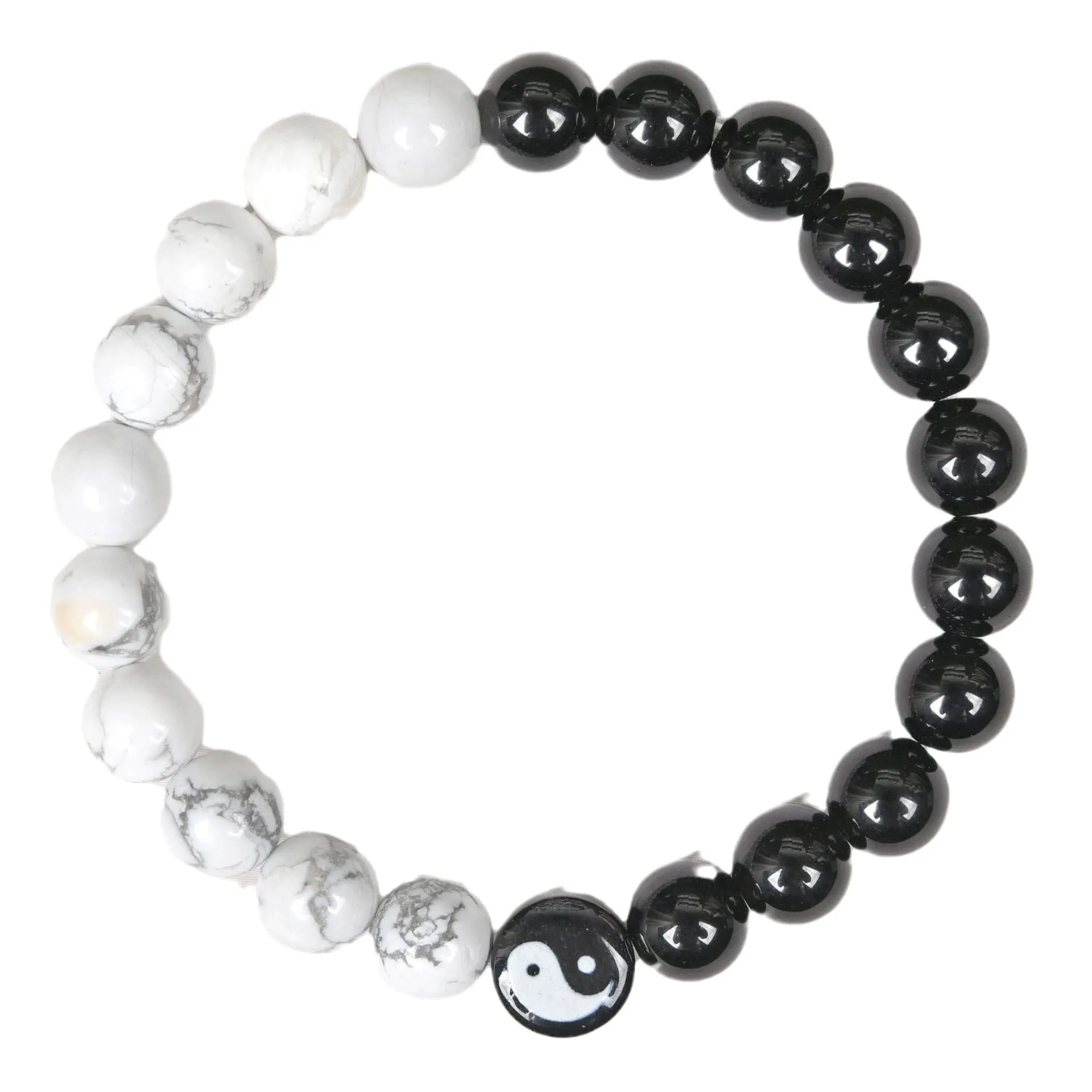White turquoise and natural obsidian 8mm bead bracelet on a flat surface