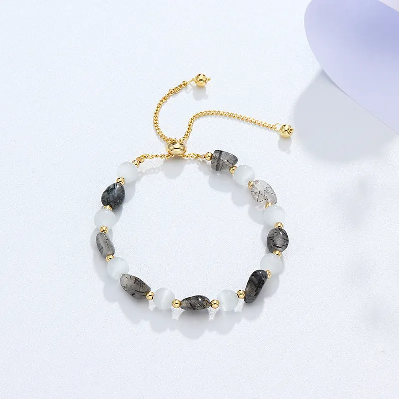 Women's polished crystal and opal natural stone bracelet in amethyst colour