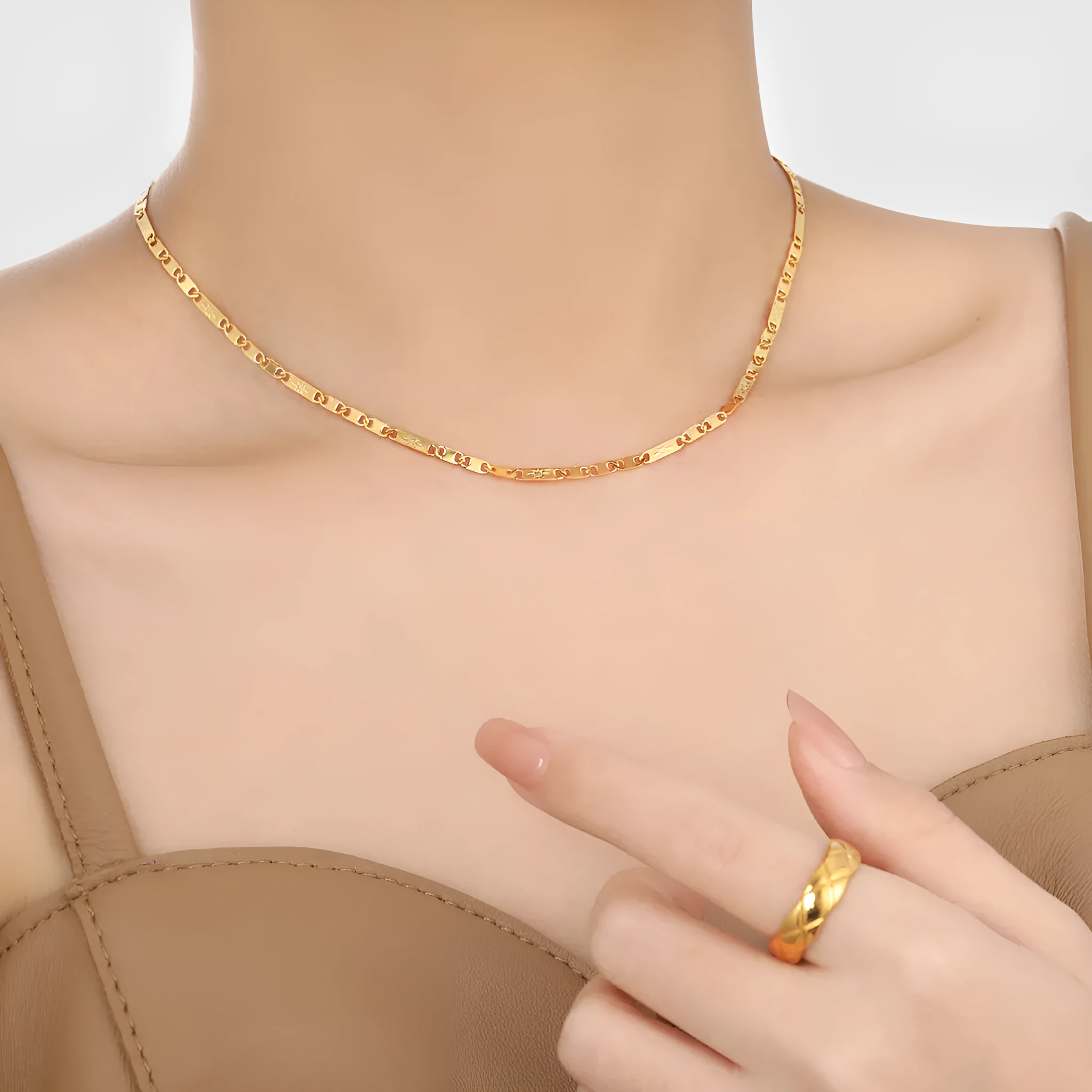 Gold electroplated titanium steel necklace with hammer pattern and Chinese character pendant on a stud chain