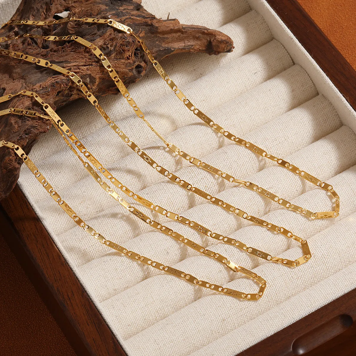 Gold electroplated titanium steel necklace with hammer pattern and Chinese character pendant on a stud chain