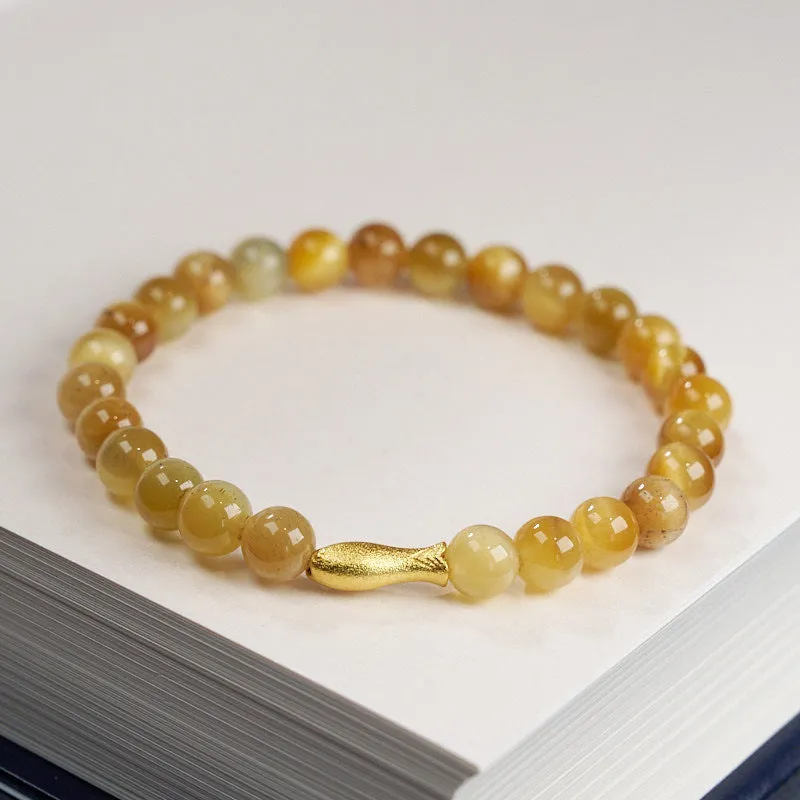 Handmade tigereye beaded bracelet with small fish pendant, natural stone beads, multiple colour options including golden tiger eye