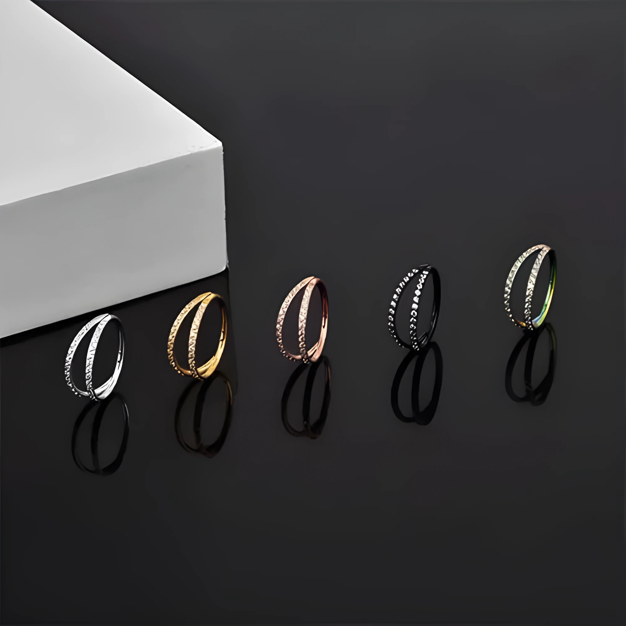Close-up of a G23 titanium alloy lip ring with a diamond zircon finish in gold colour.