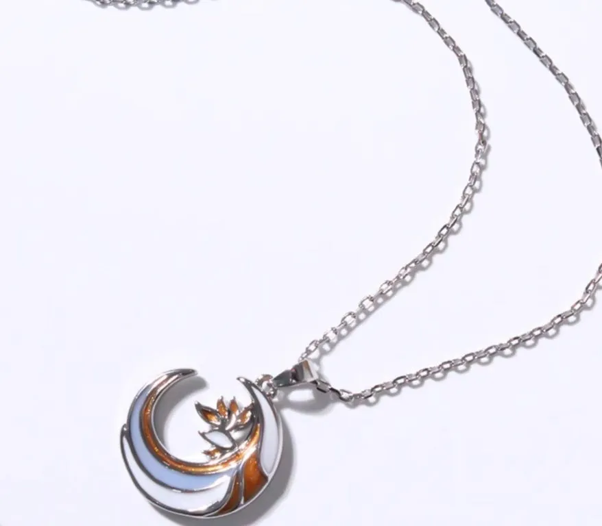 Handmade gold enamel crescent moon pendant necklace on clavicle chain