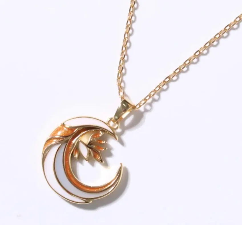 Handmade gold enamel crescent moon pendant necklace on clavicle chain