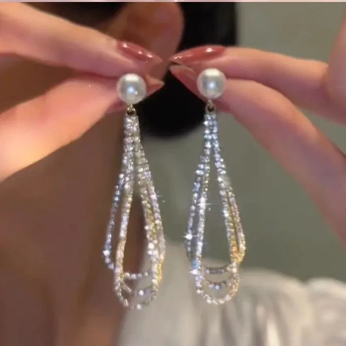Light luxury tassel long earrings for women, geometric design, alloy with electroplated finish.