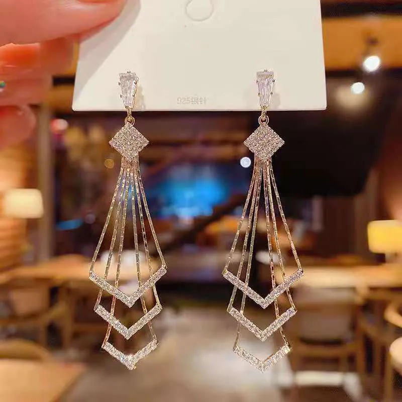 Light luxury tassel long earrings for women, geometric design, alloy with electroplated finish.