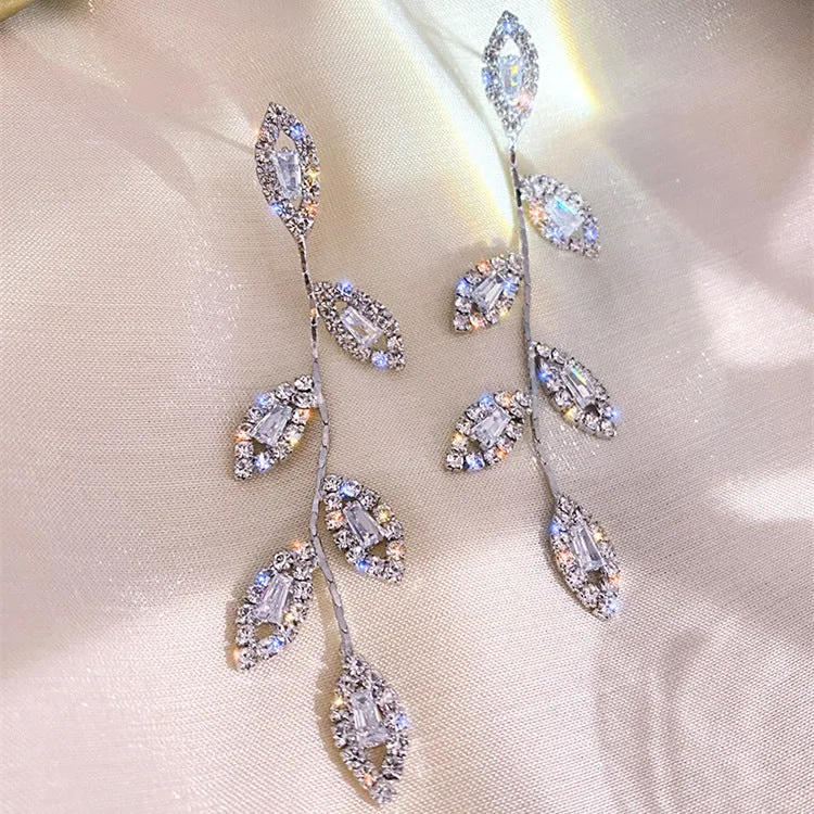 Light luxury tassel long earrings for women, geometric design, alloy with electroplated finish.