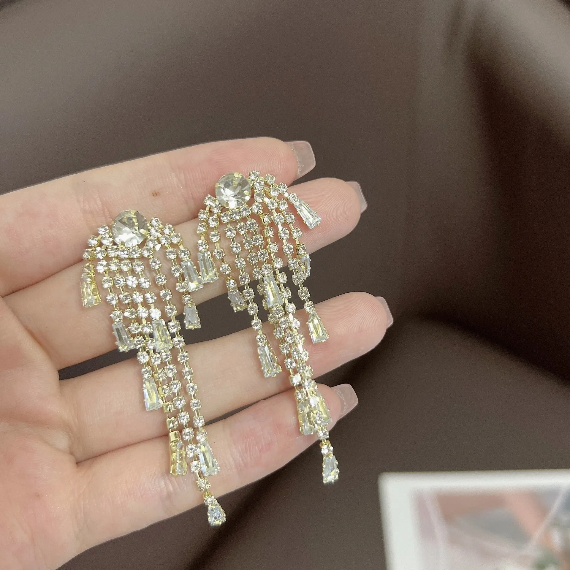 Light luxury tassel long earrings for women, geometric design, alloy with electroplated finish.