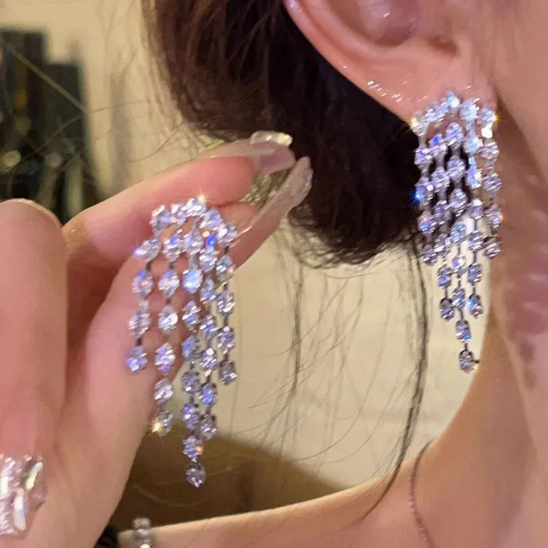 Light luxury tassel long earrings for women, geometric design, alloy with electroplated finish.