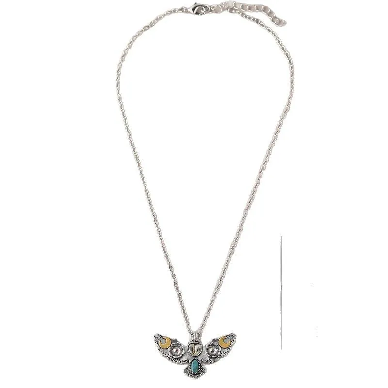 Silver electroplated alloy necklace with owl, moon, and flower pendant on unisex chain