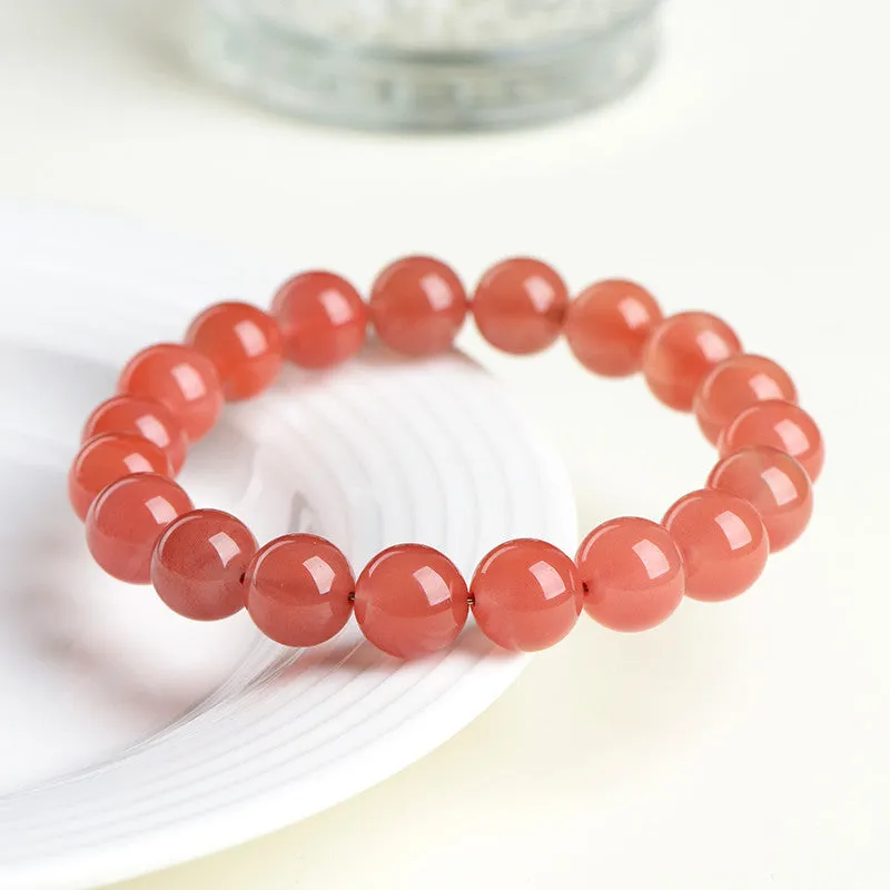 Natural cherry red agate bracelet with polished scattered beads, shown in a single circle style.