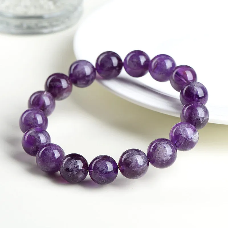 Natural feather Amethyst Snow Mountain purple crystal bracelet with geometric beads and Ruyi element.