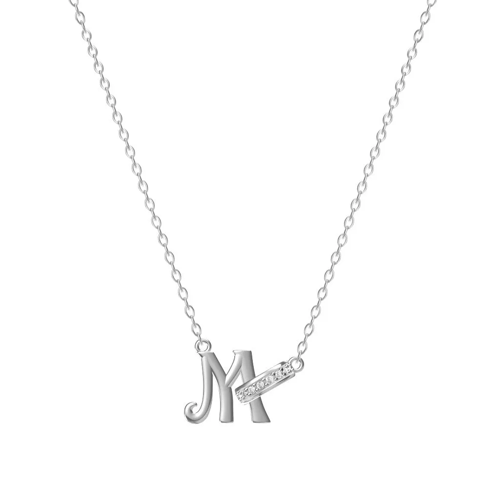 Women's 26-letter initial necklace in titanium steel with a round zircon pendant on a cross chain, colour option shown