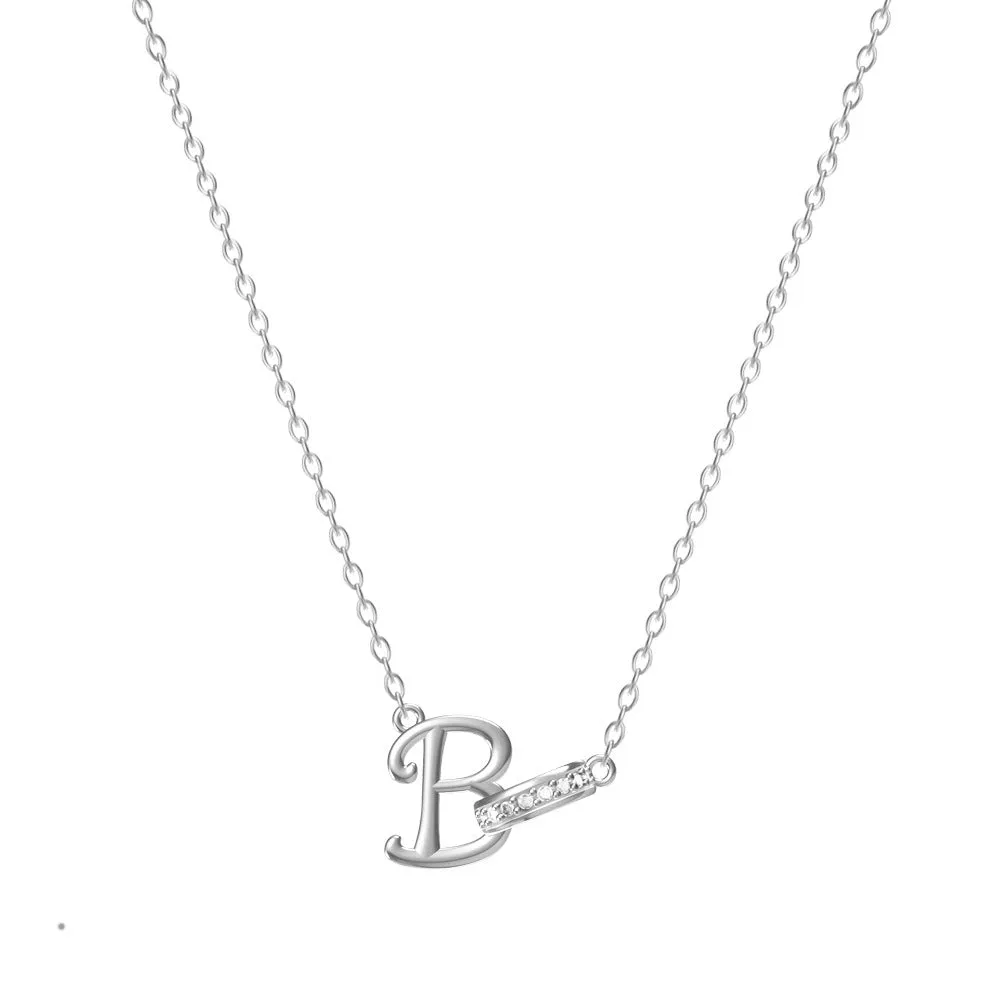 Women's 26-letter initial necklace in titanium steel with a round zircon pendant on a cross chain, colour option shown