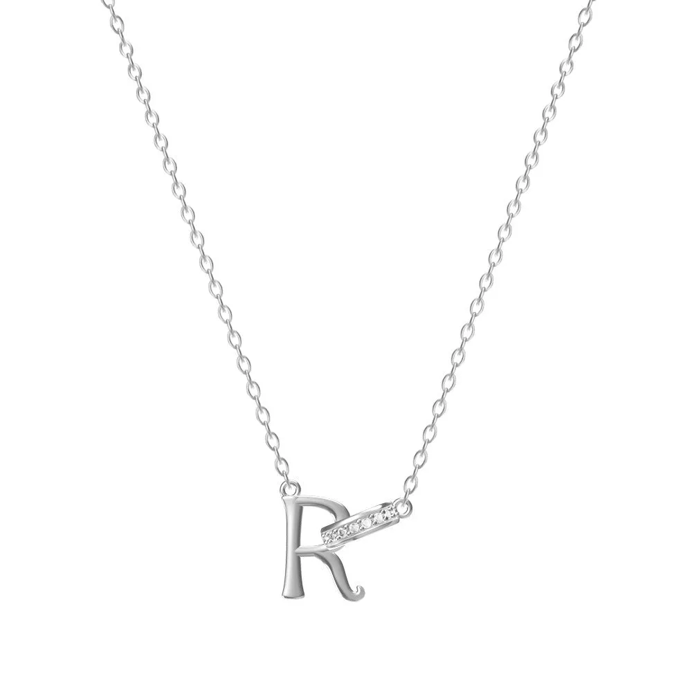 Women's 26-letter initial necklace in titanium steel with a round zircon pendant on a cross chain, colour option shown