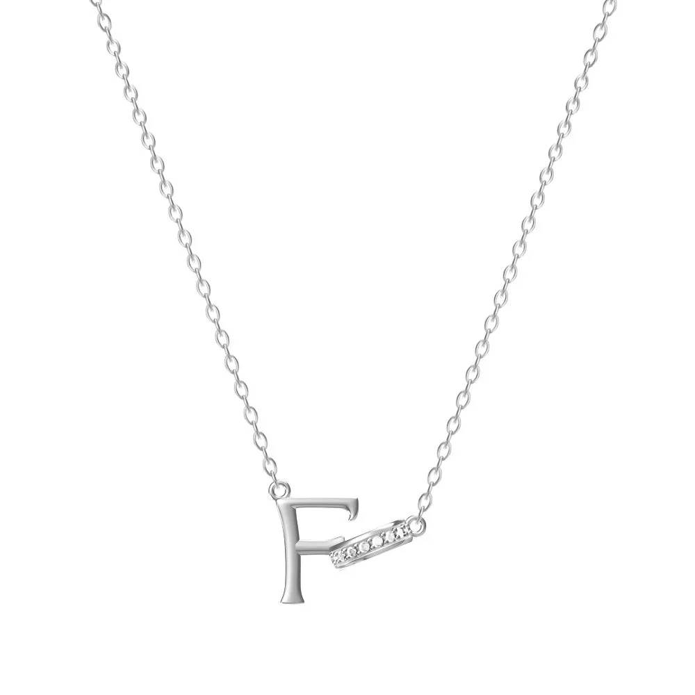 Women's 26-letter initial necklace in titanium steel with a round zircon pendant on a cross chain, colour option shown