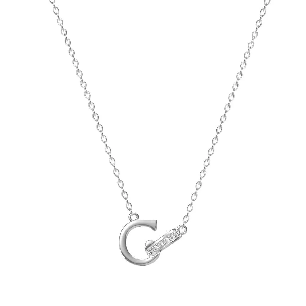 Women's 26-letter initial necklace in titanium steel with a round zircon pendant on a cross chain, colour option shown
