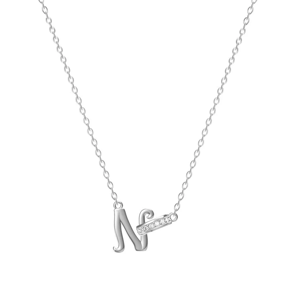 Women's 26-letter initial necklace in titanium steel with a round zircon pendant on a cross chain, colour option shown