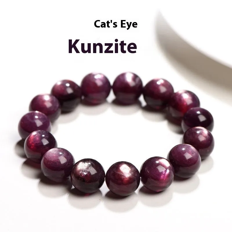 Natural purple lepidolite crystal round bead bracelet on a white background.