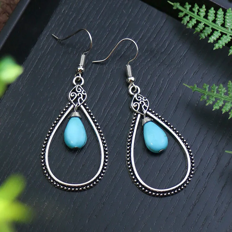 Women's retro exaggerated earrings with geometric shape and tassel details in alloy with electroplating finish