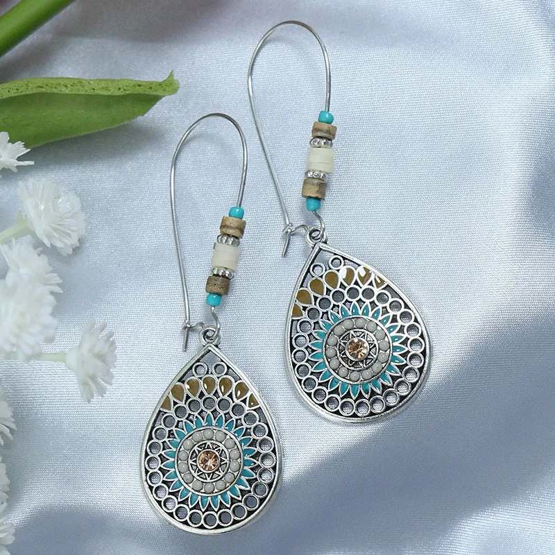 Women's retro exaggerated earrings with geometric shape and tassel details in alloy with electroplating finish