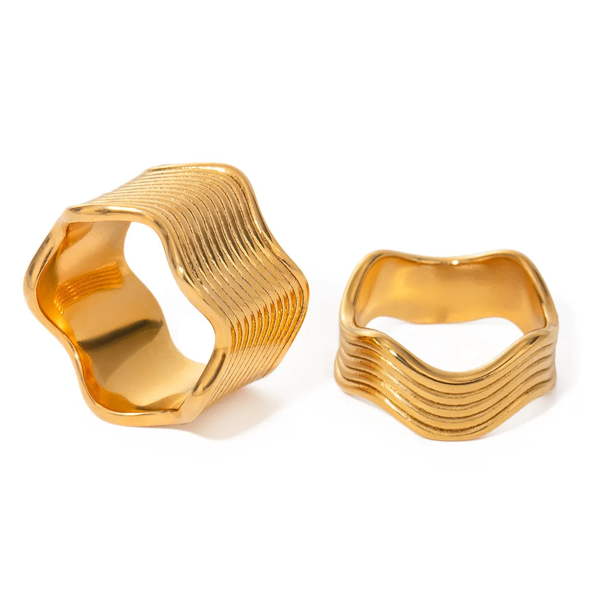 Stainless steel wide geometric wave ring with Korean style electroplated finish.