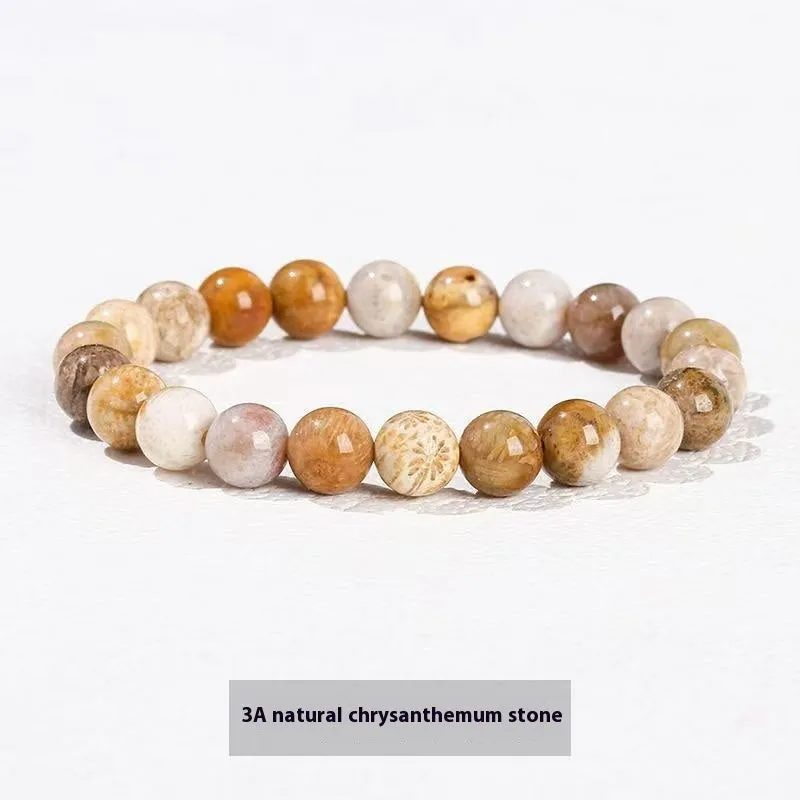 Natural tigereye crystal bracelet with yellow tiger eye beads approximately 8mm diameter on elastic cord