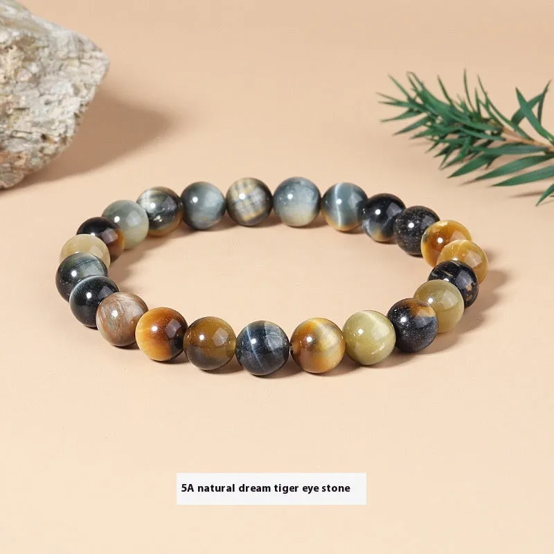 Natural tigereye crystal bracelet with yellow tiger eye beads approximately 8mm diameter on elastic cord