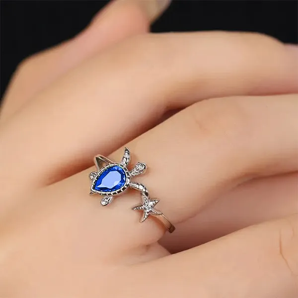 Blue alloy ring with turtle and starfish designs, women's vacation style, size 6-10