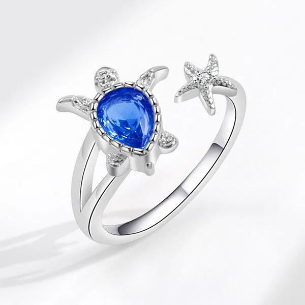 Blue alloy ring with turtle and starfish designs, women's vacation style, size 6-10