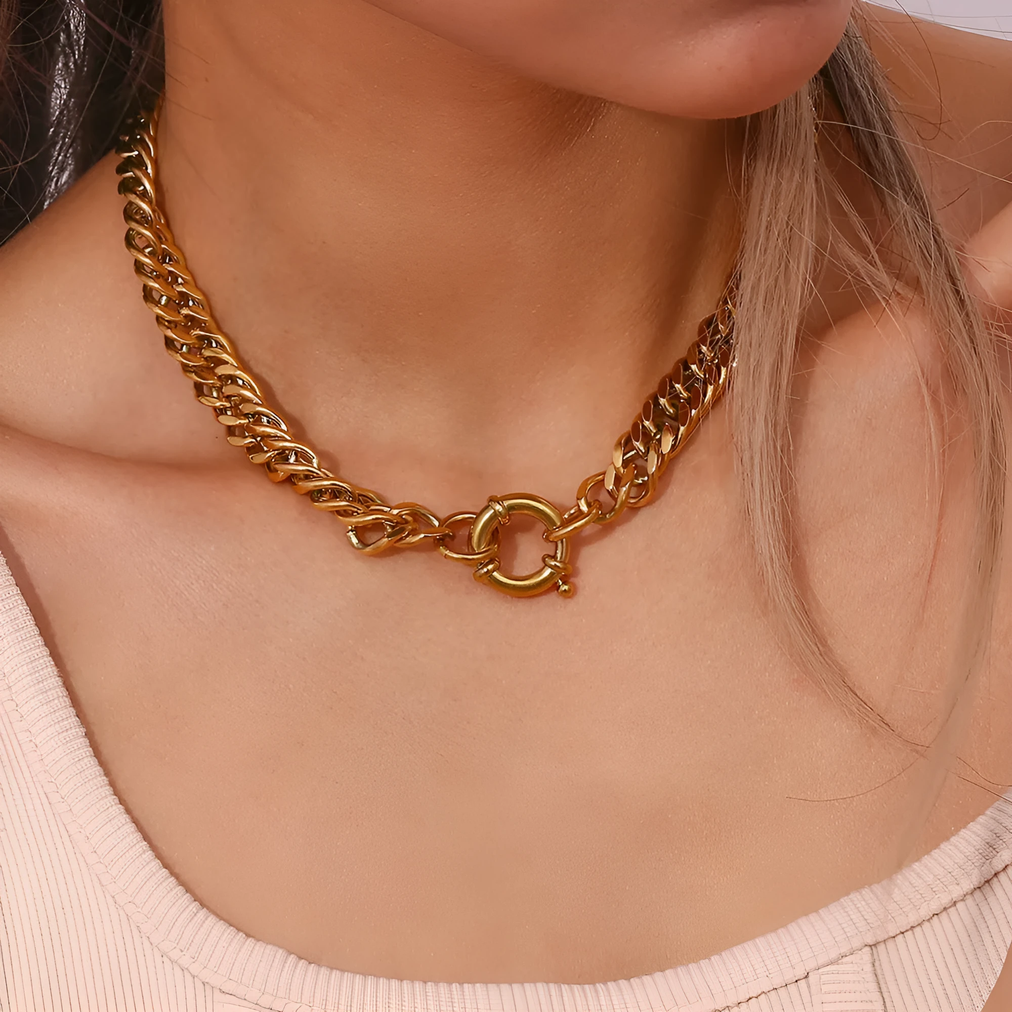 Stainless steel 18K plated gold clavicle necklace with thick encrypted chain and OT buckle on white background