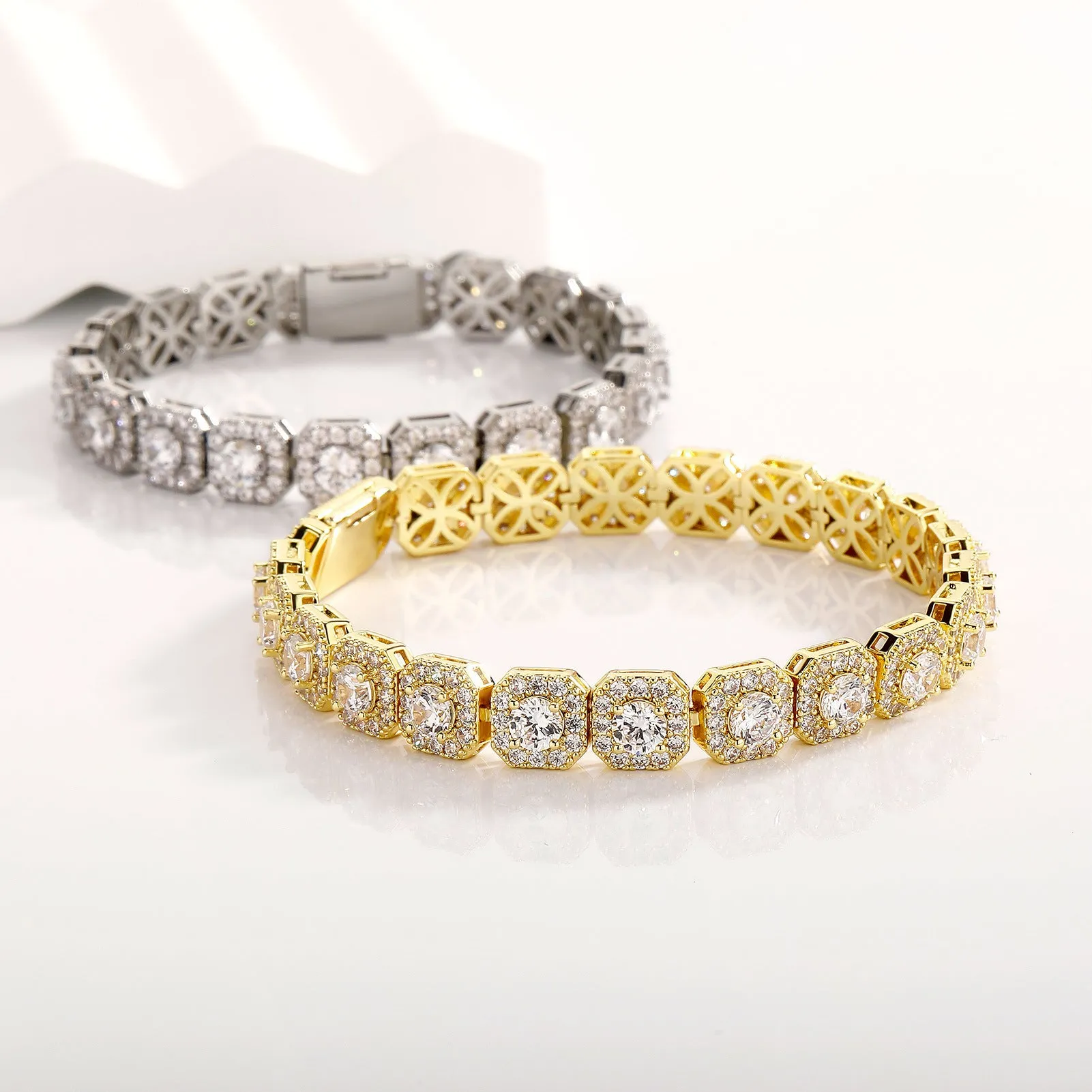 Men's silver zircon flip Cuban chain bracelet on wrist showing inlaid zircon and clasp detail