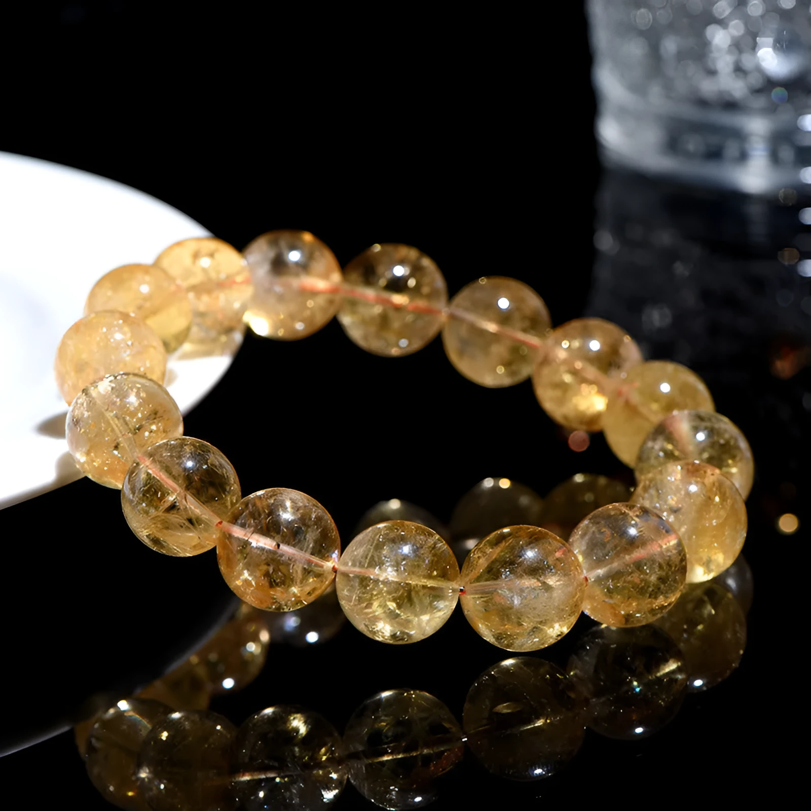 Natural yellow citrine bracelet with spherical beads in Brazilian yellow and violent yellow colour options