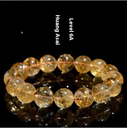 Natural yellow citrine bracelet with spherical beads in Brazilian yellow and violent yellow colour options