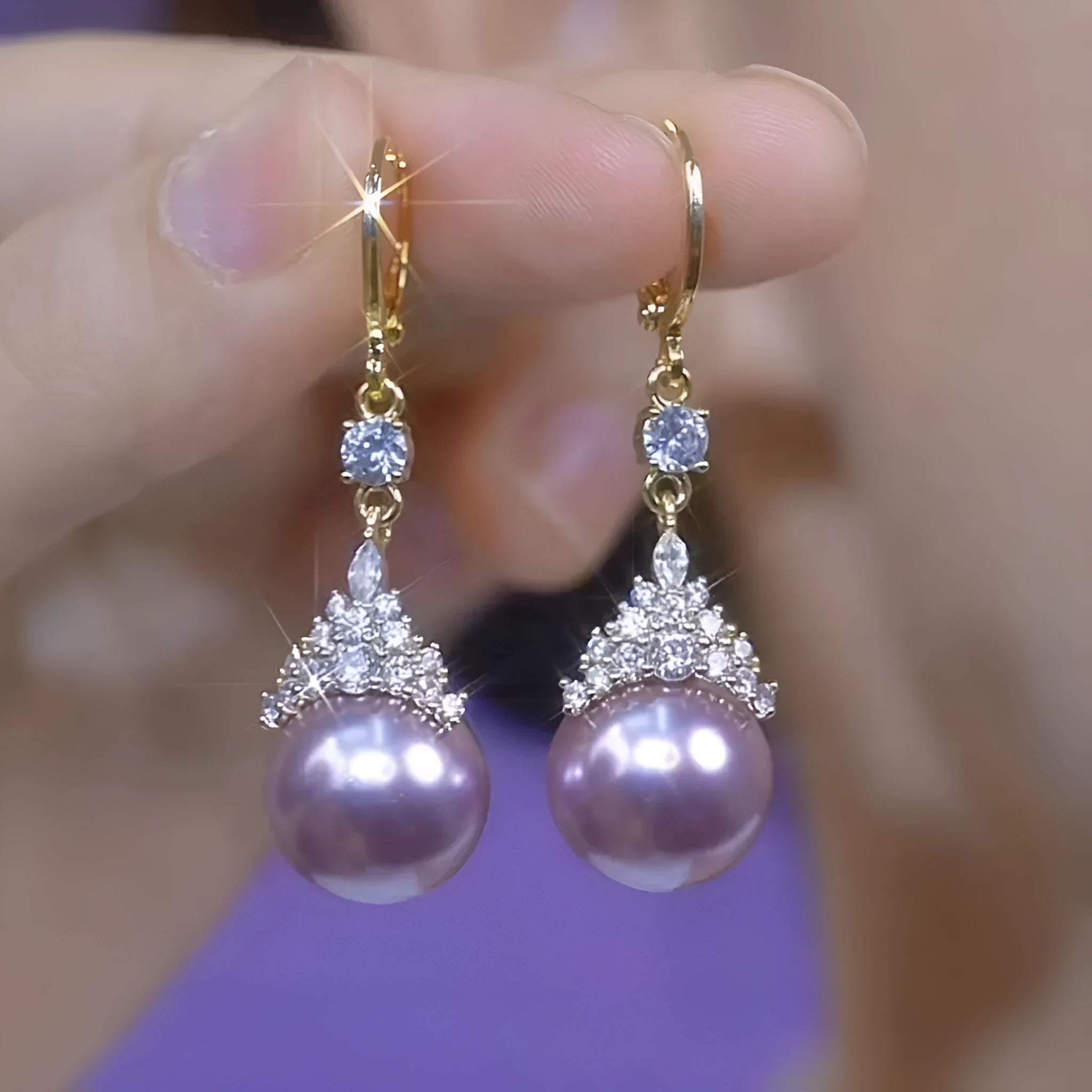 Purple alloy drop shape ear clip with crown design and electroplated finish for women