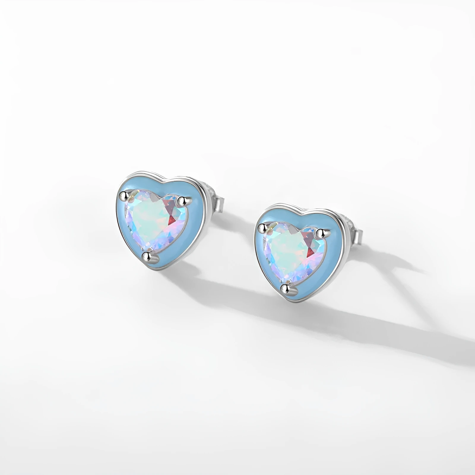S925 sterling silver heart-shaped stud earrings with colourful zircon mosaic and epoxy accents on silver background