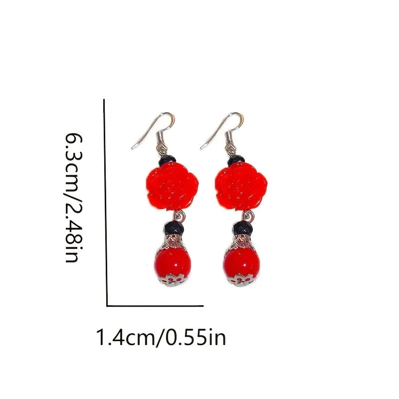Copper butterfly stud earrings with rhinestone and diamond finish in red colour for women
