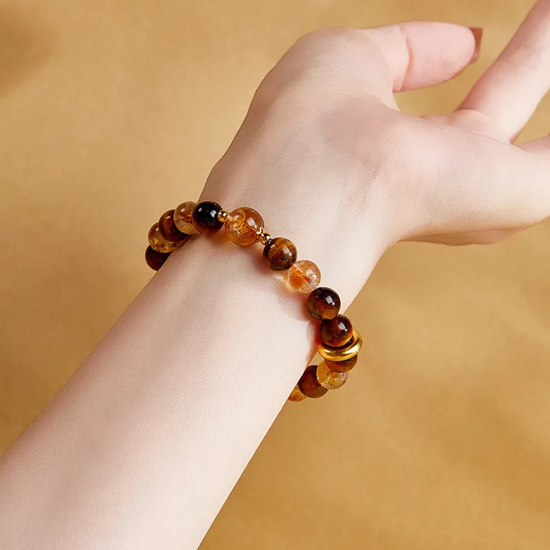 Women's sterling silver tigereye bracelet with 8mm dome tiger beads and certificate