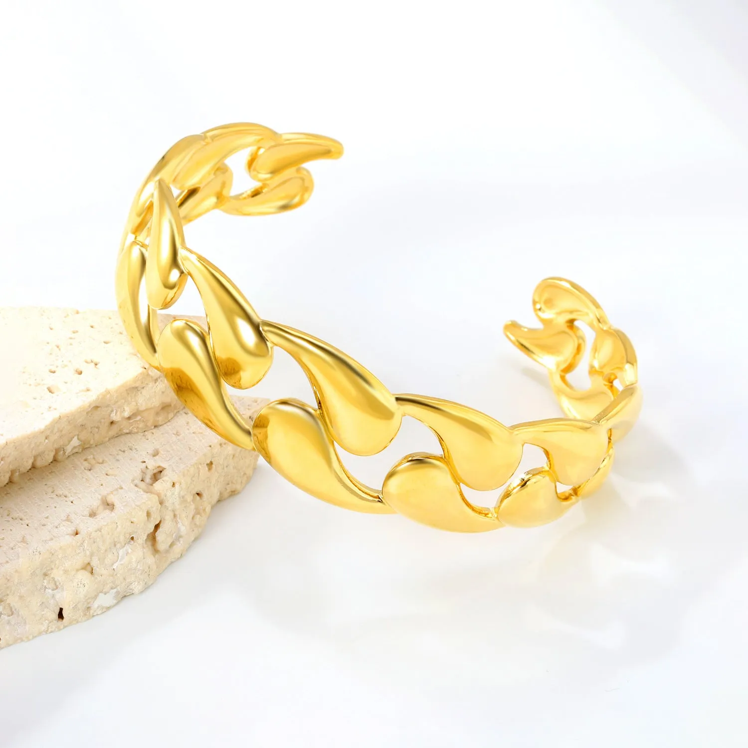 Stainless steel alloy bracelet in gold or silver tone for European American trend styling.