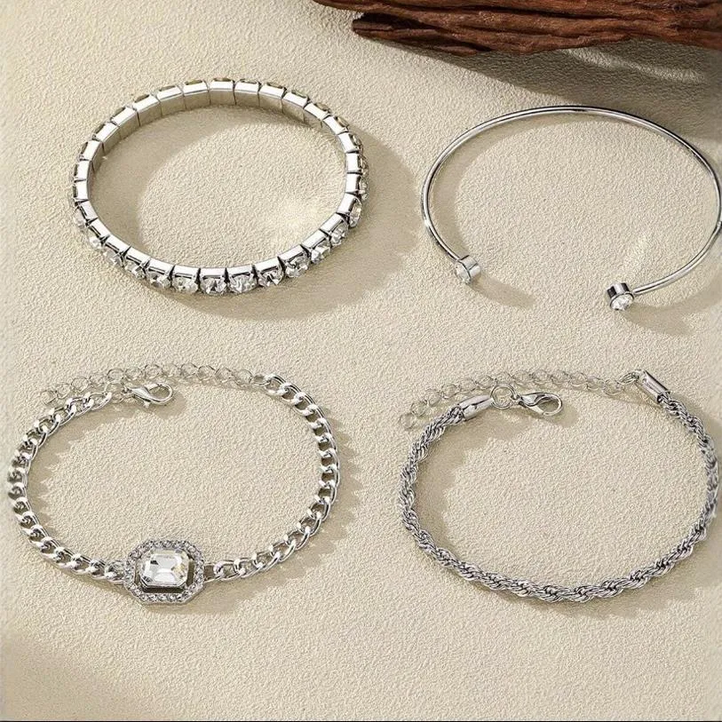 Retro geometric alloy four-piece jewellery set showing bracelet, earrings, necklace and ring with square diamond chain designs